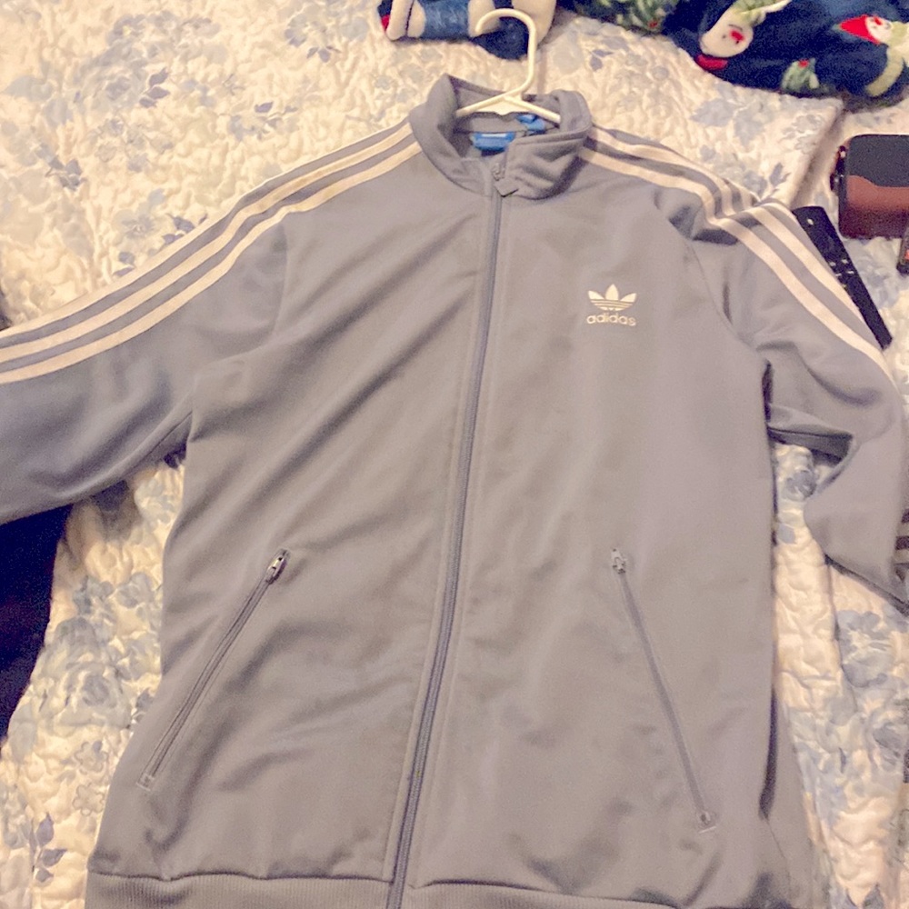 Adidas grey and white big kids XL fits Adult Small as I wore it… authentic